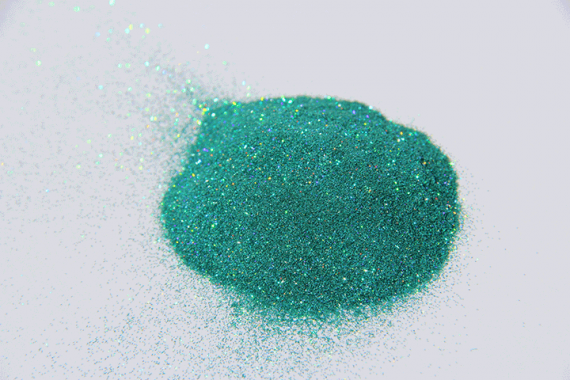 Small pile of Aqua Blue Holographic Metal Flake