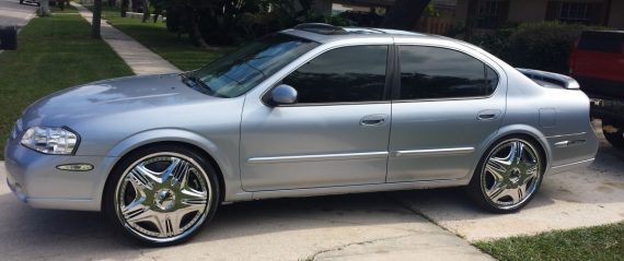 Cold Blue Steel Candy Pearl car over a silver base coat side view